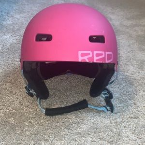 Pink snowboarding/skiing helmet